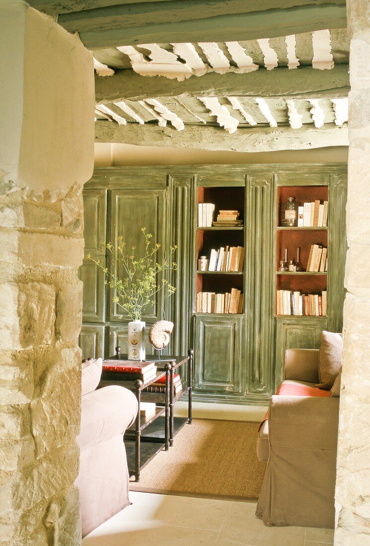 View of bookcase in Provençal living room