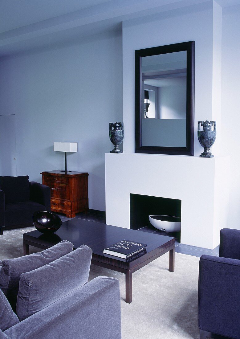 Seating in front of modern fireplace