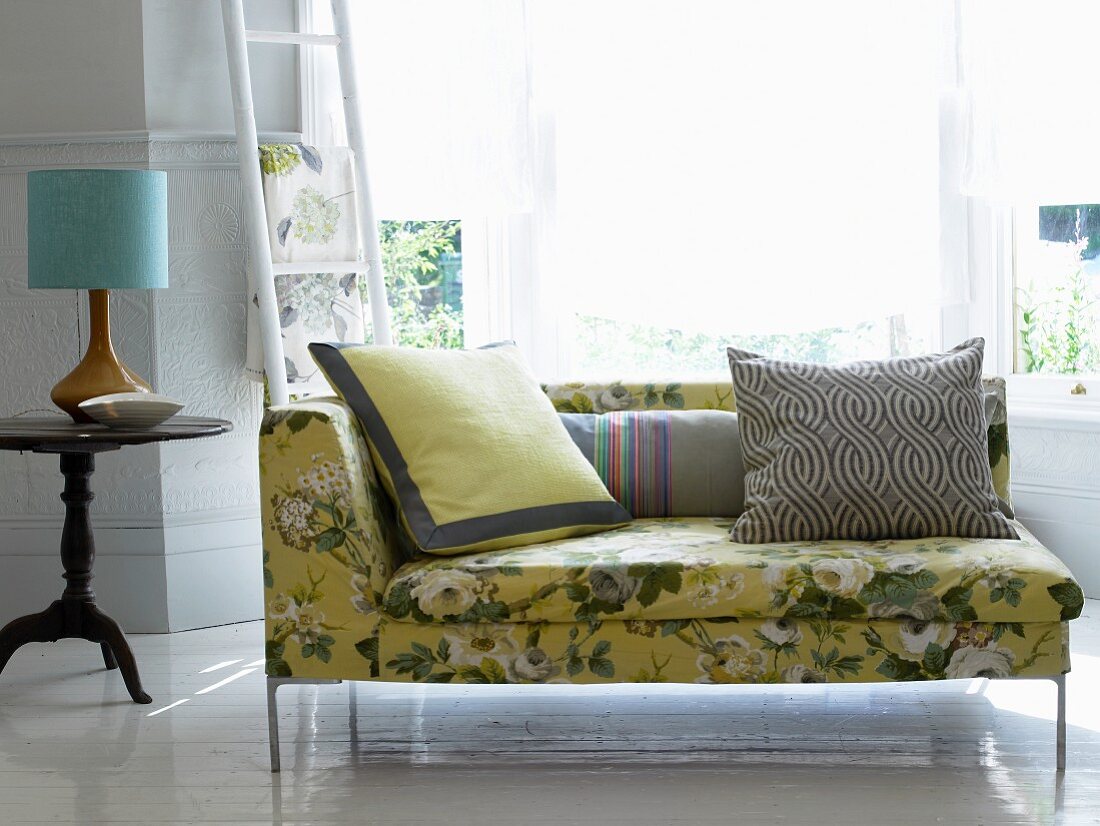 Floral recamier with scatter cushions