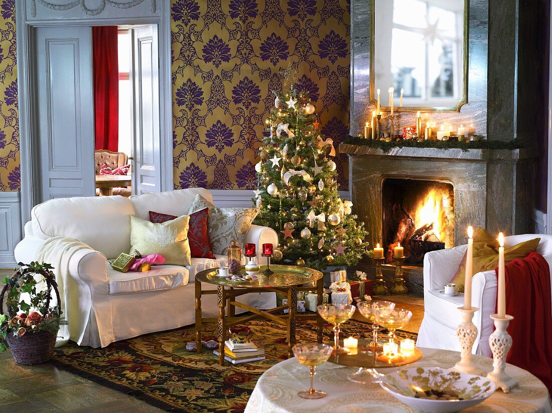 Festive Christmas atmosphere in traditional living room with blazing open fire