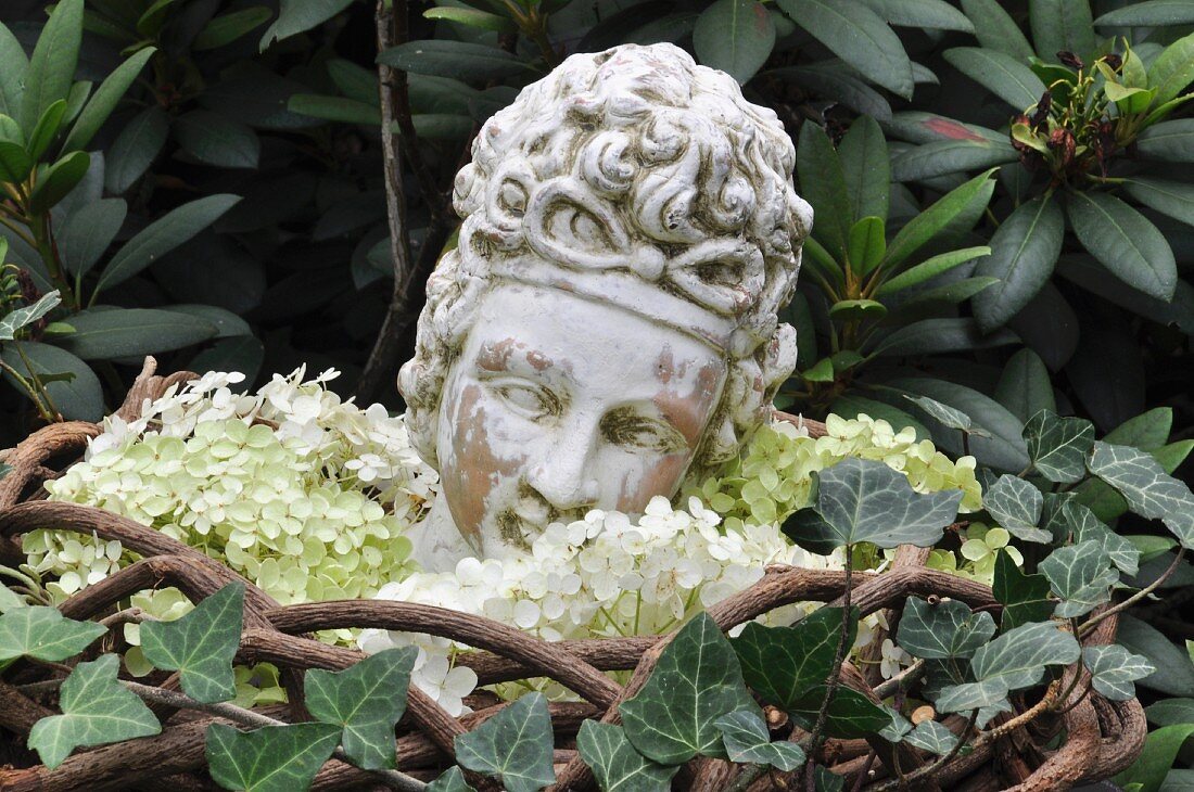Bust of woman as garden decor