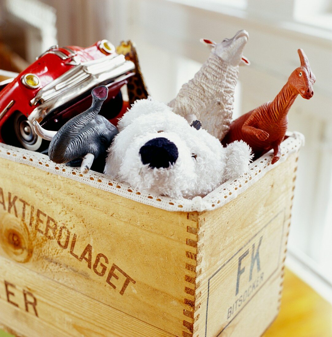 Wooden crate with toys