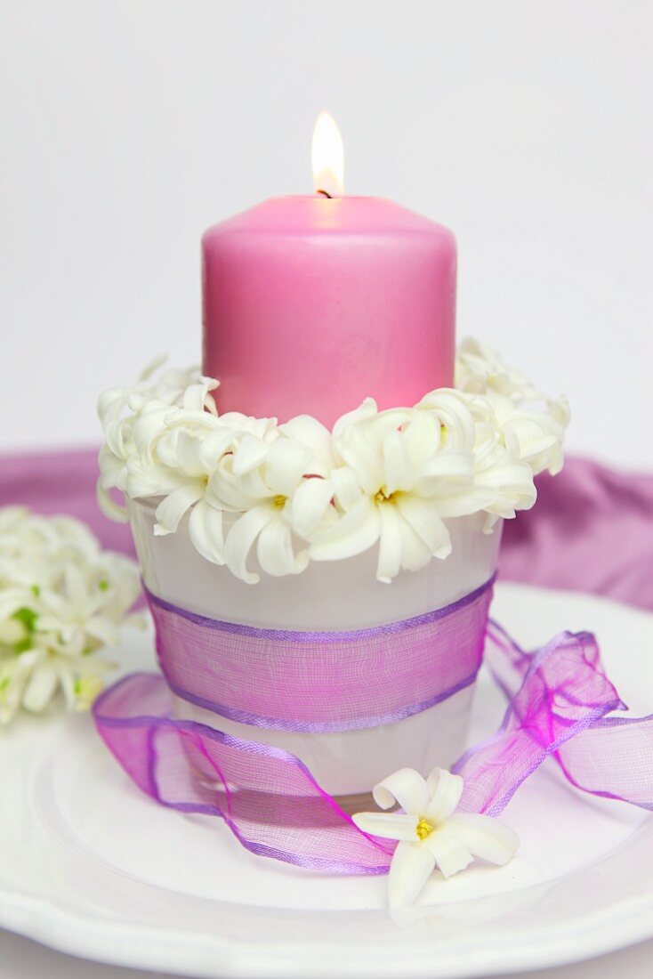 Candle with circlet of hyacinth florets