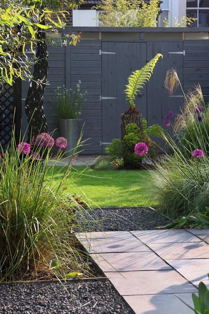 Modern garden with wooden shed