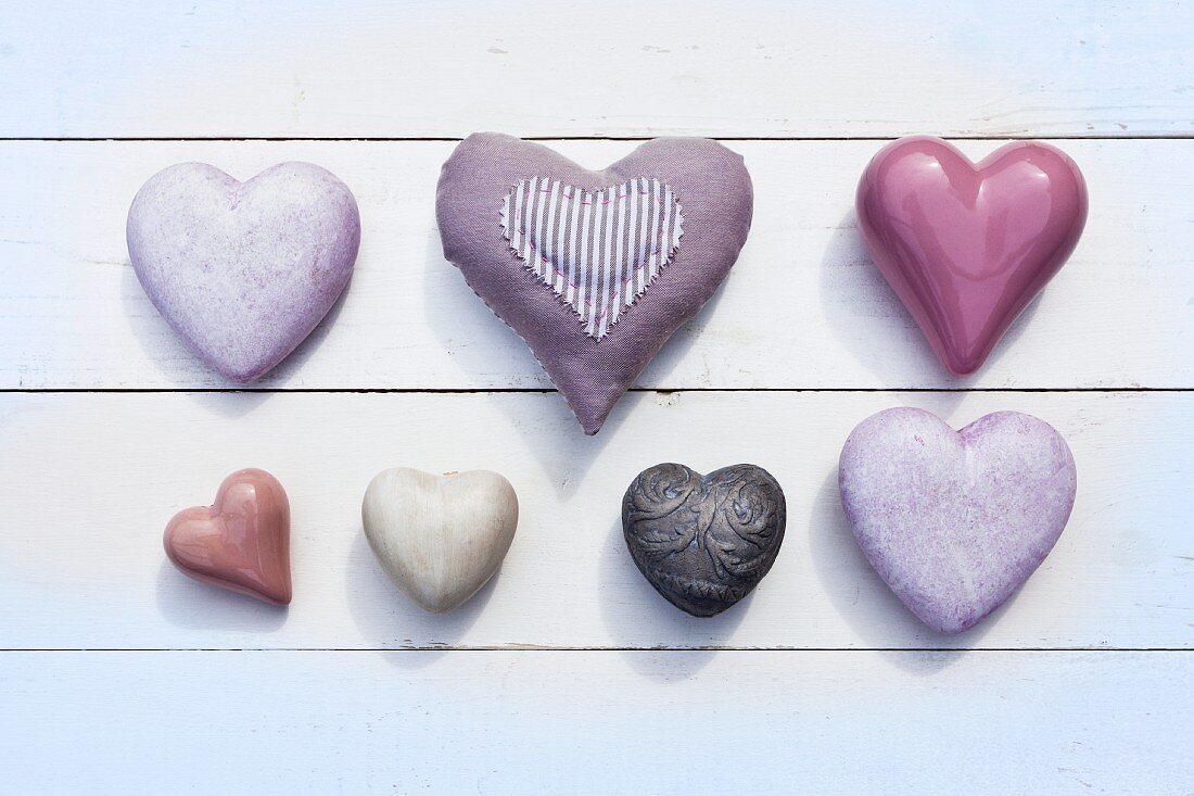 Purple hearts made of different materials