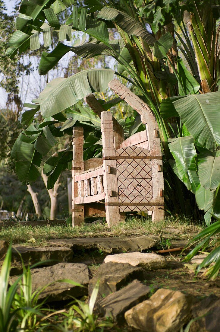 Egyptian wooden bench in garden