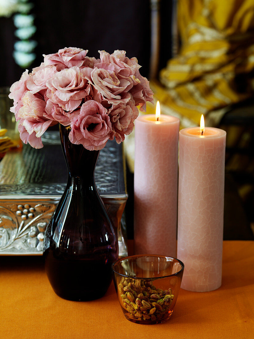 Flowers Candles And Pistachios On A Buy Image 11055998 Living4media