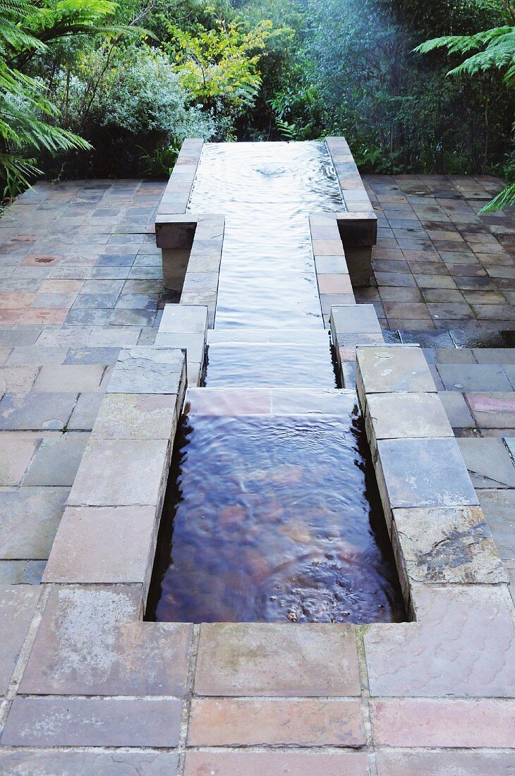 Multilevel pond with slate surround