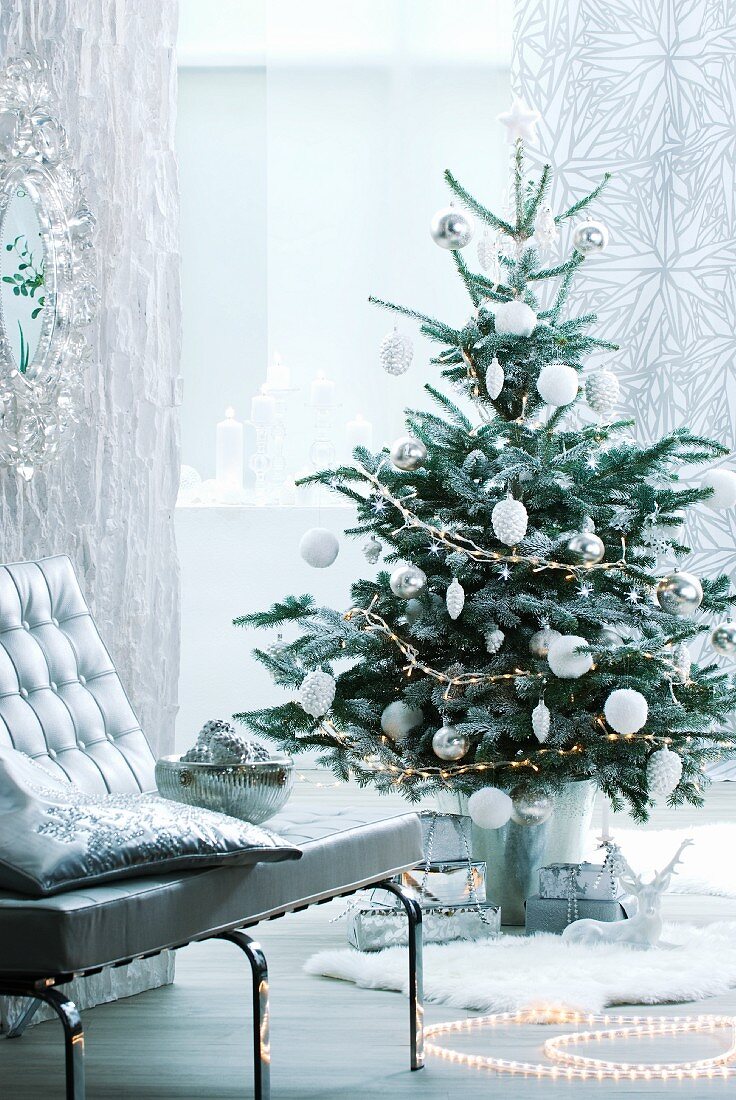 Christmas tree decorated in silver and white