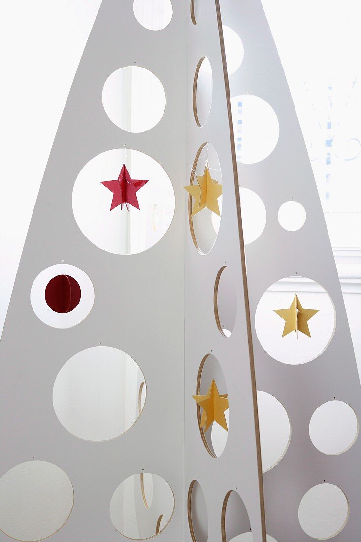White plywood Christmas tree with decorations
