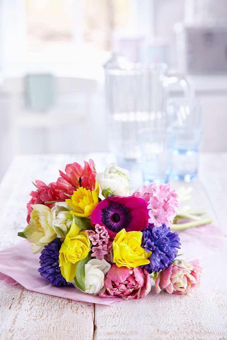 Spring bouquet of hyacinths, narcissus, tulips, ranunculus and anemones