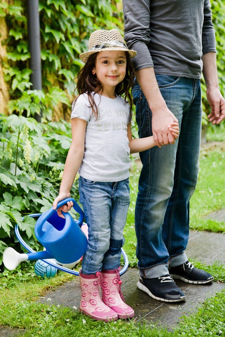 Father and daughter in garden