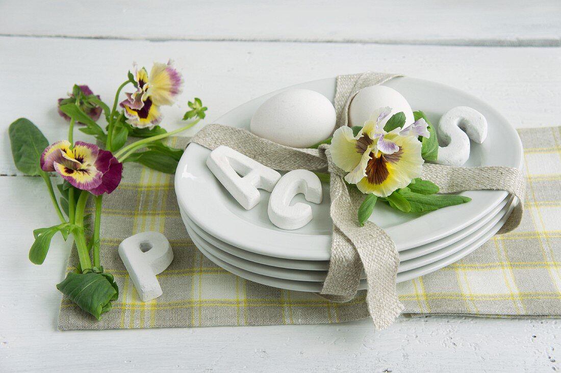 Easter table centrepiece of pansies & eggs