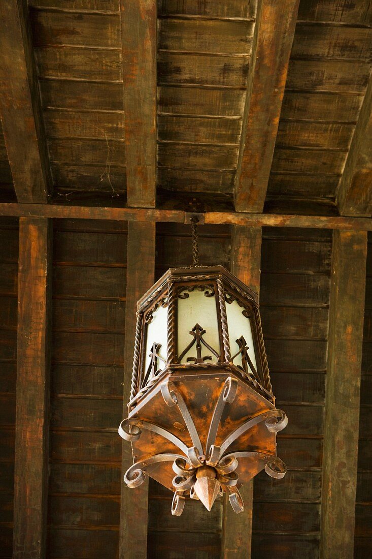 Old wrought iron lantern style chandelier