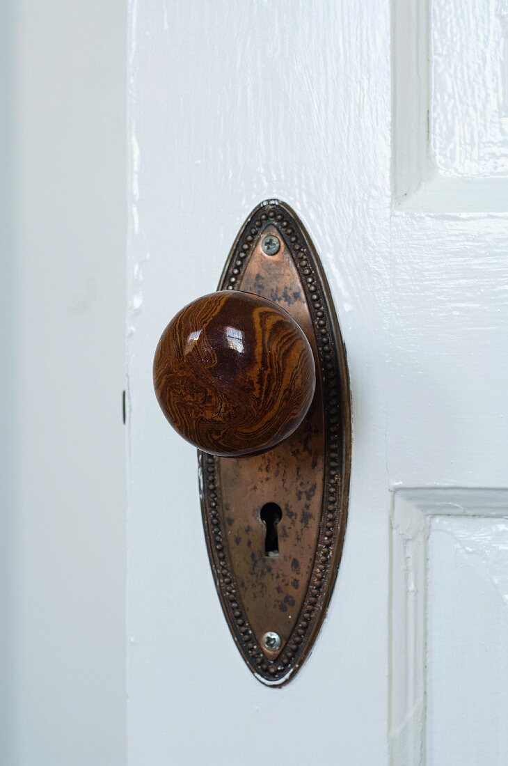 Brown doorknob with skeleton keyhole