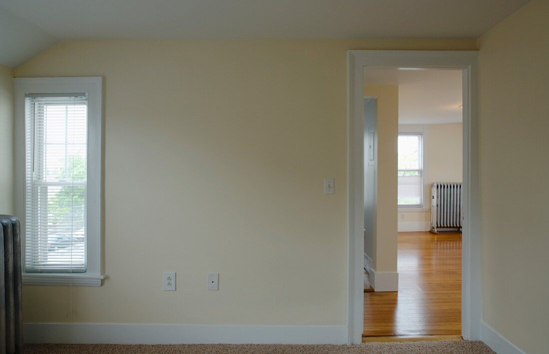 Doorway between rooms in empty apartment