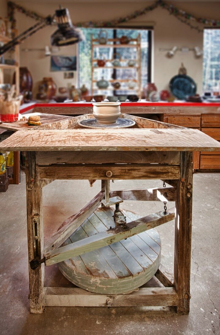 An old potter's wheel in a potter's studio