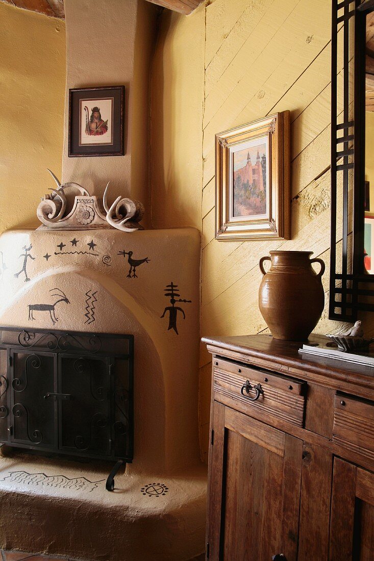 Kiva fireplace and cabinet