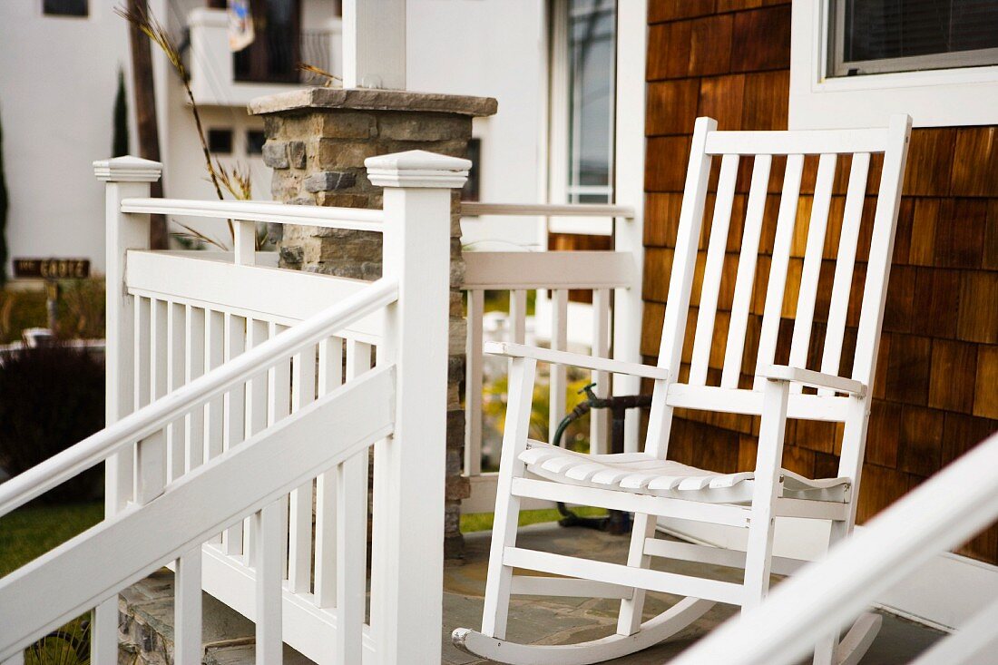 White Rocking Chair on Front Porch