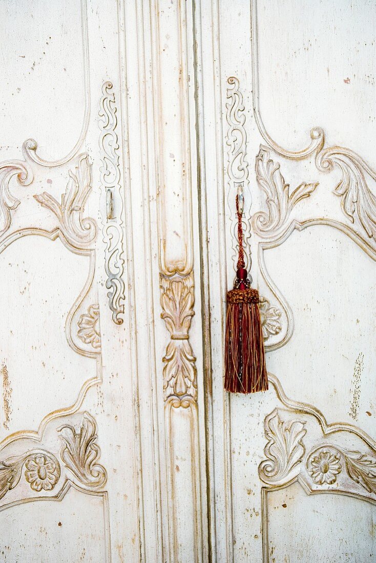 Detail of Tassels on Ornate Armoire