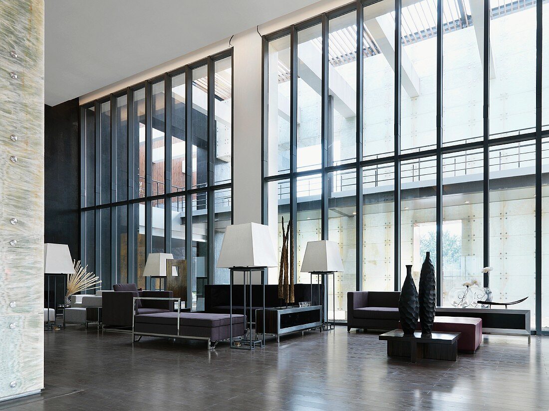 Sitting area with high ceilings and modern furniture