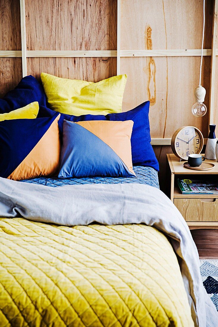 Colorful bed with graphic pillows