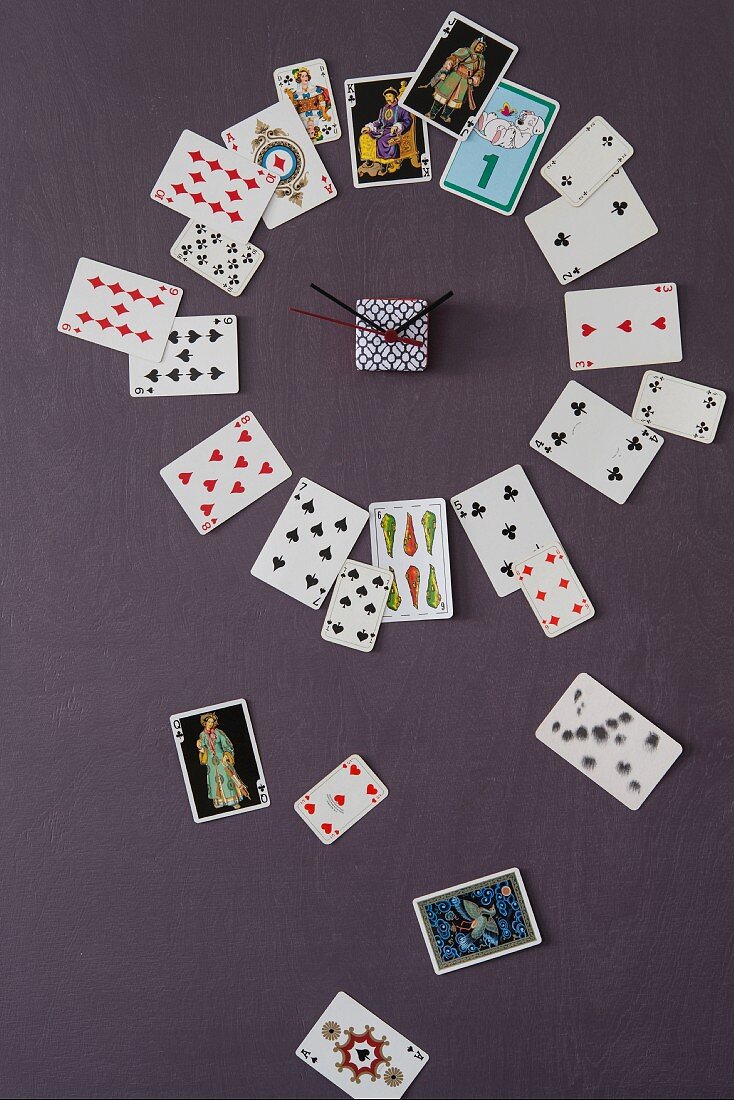 A clock made from playing cards