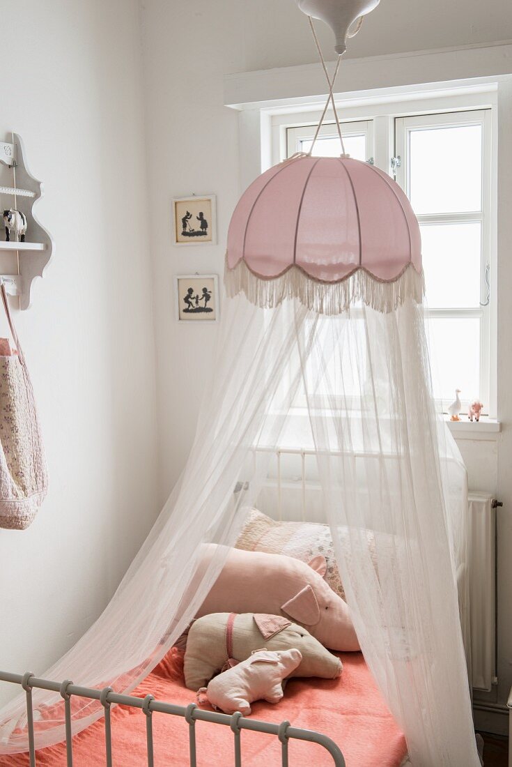 A pendant lamp with a mosquito net