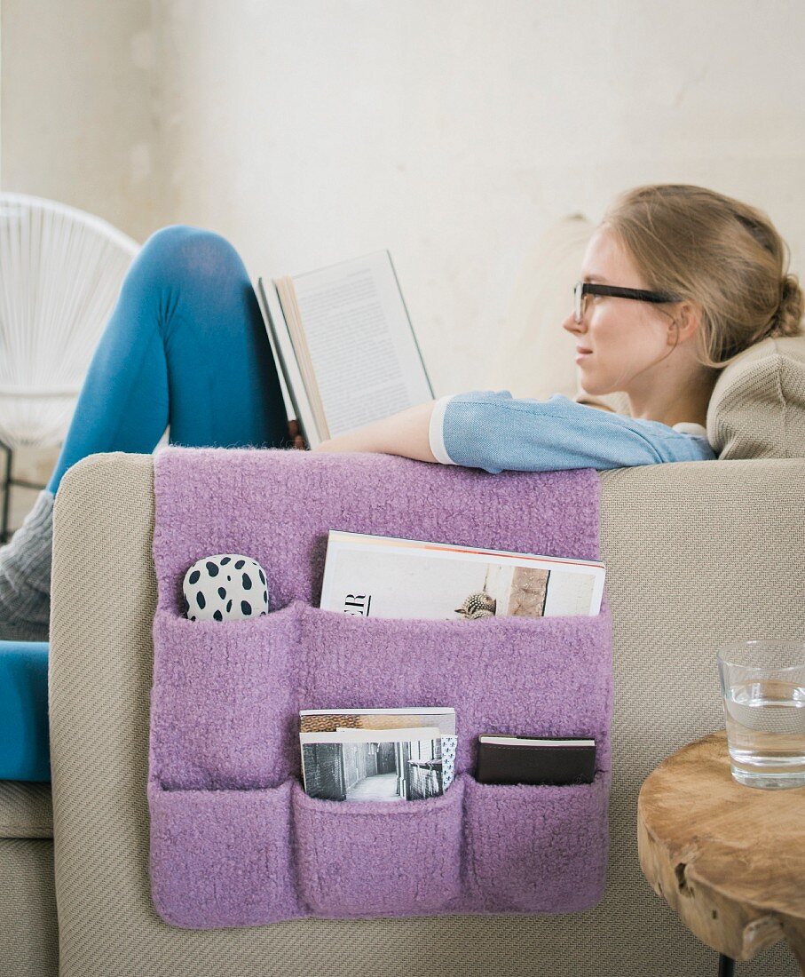 A homemade, knitted living room tidy made from felt wool