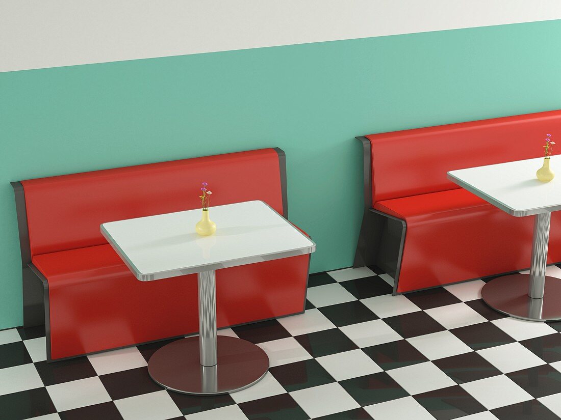 Café im amerikanischen Stil mit roten Sitzbänken, Metalltischen & Schachbrettmusterboden