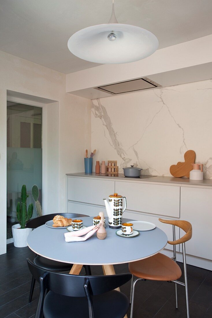 Simple kitchen with designer dining set