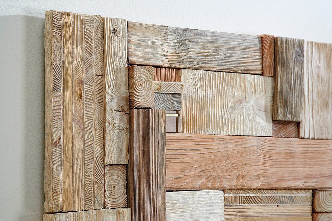 Artwork made from wooden remnants on wall (detail)