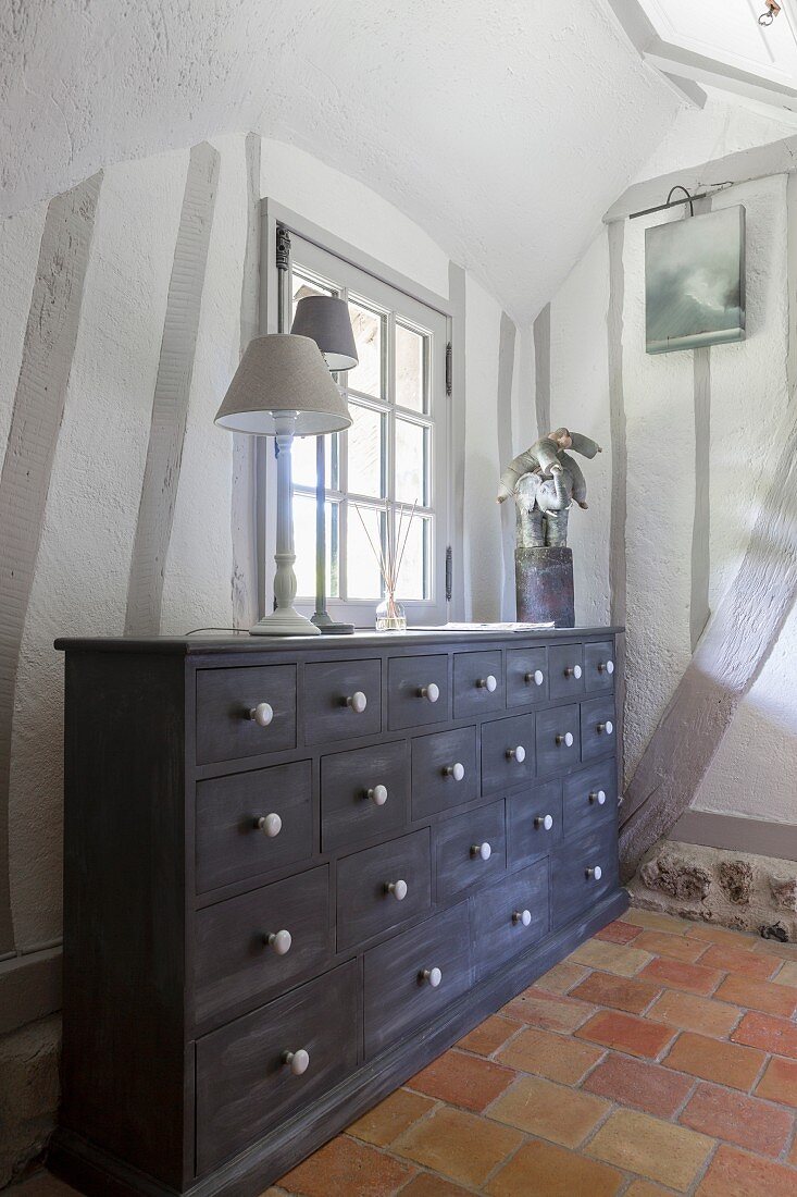 Chest of drawers in farmhouse with half-timbered interior walls