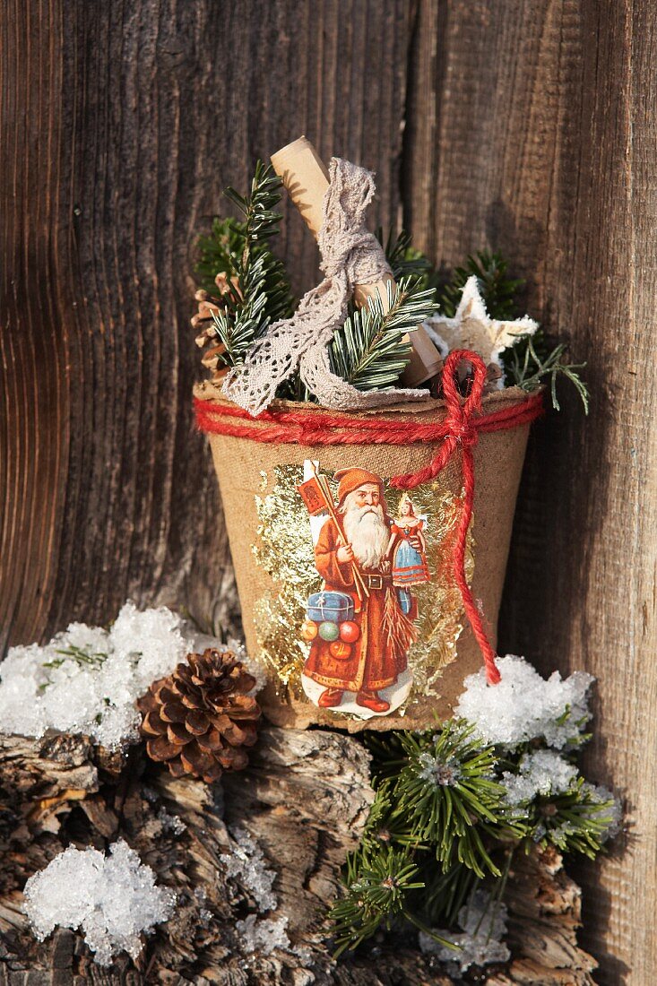 Plant pot decorated with a Father Christmas motif