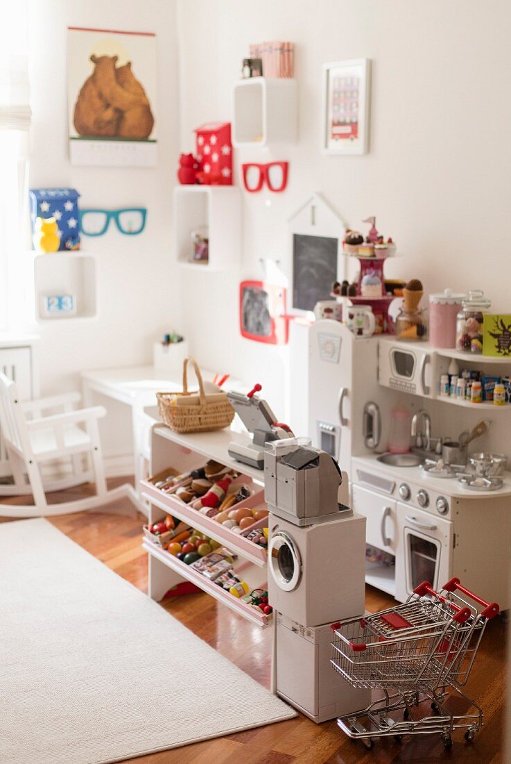 Toy shop and kitchen in child's bedroom