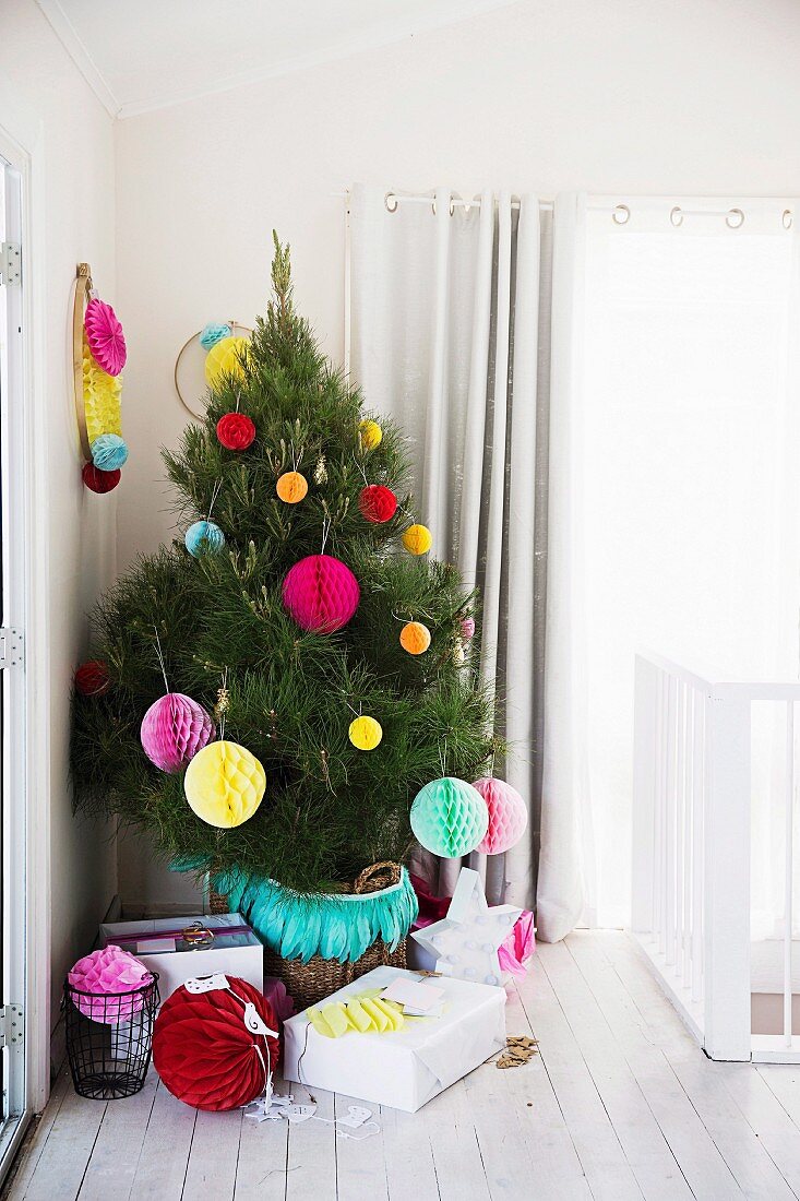 Colorfully decorated Christmas tree with paper balls