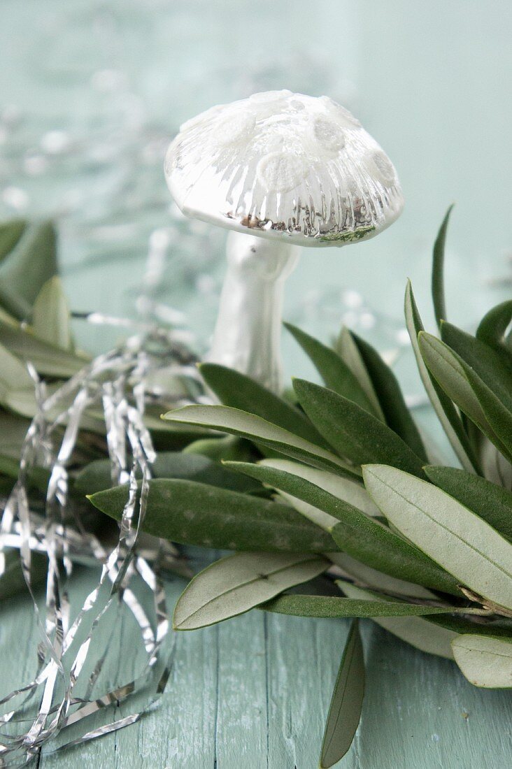 Garland of olive branches and glass mushroom ornament