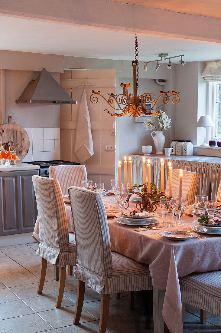 Festively set dining table in kitchen