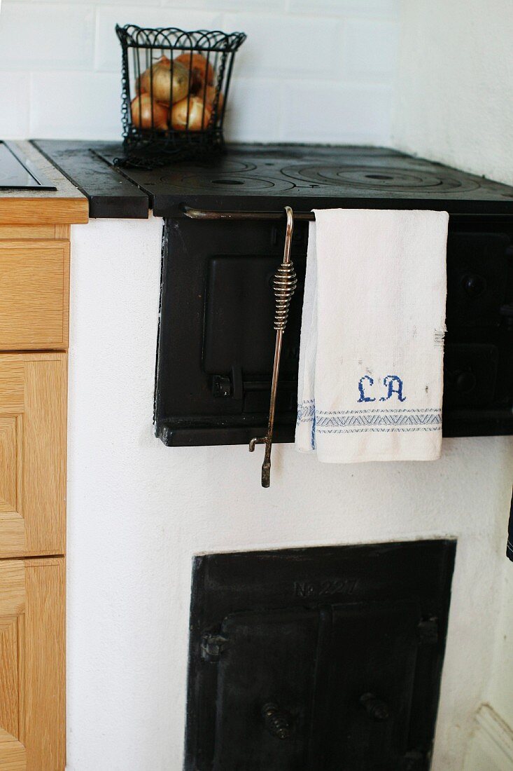 Old, masonry kitchen stove with oven