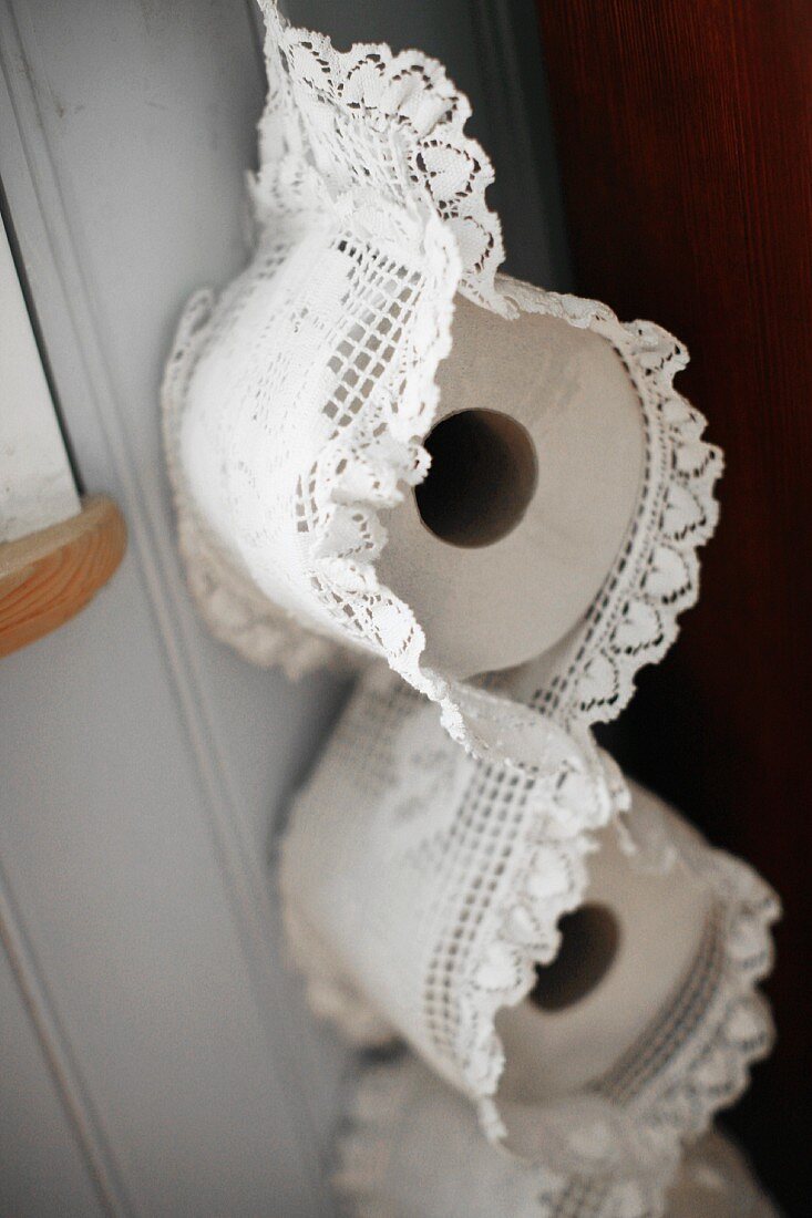 Lace toilet roll holder