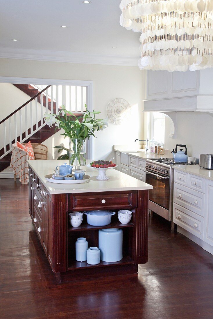 American-style kitchen with island counter and dark wooden floor