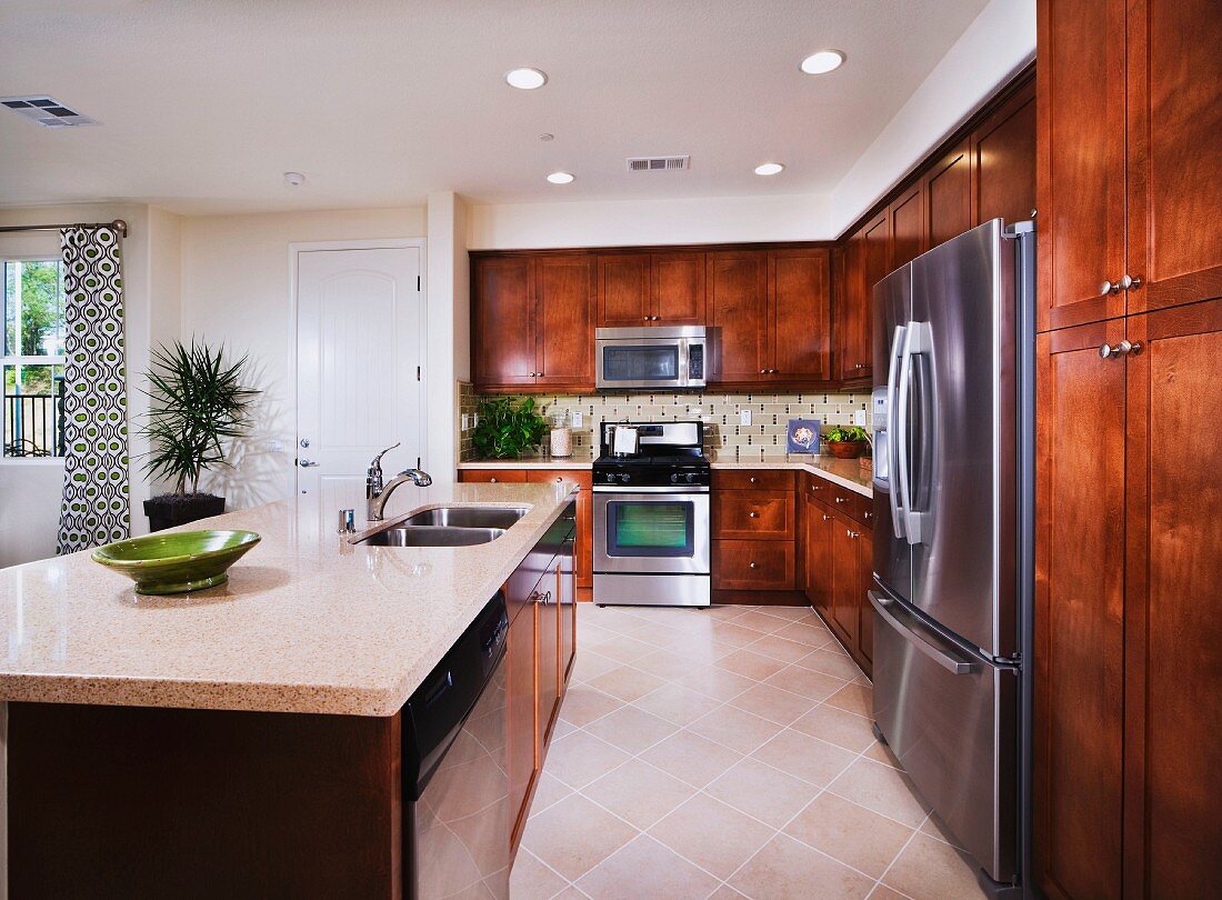 Kitchen with wooden cabinets; San Marcos; California; USA