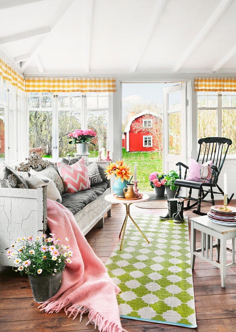 Idyllic, Swedish country-house interior with view into garden