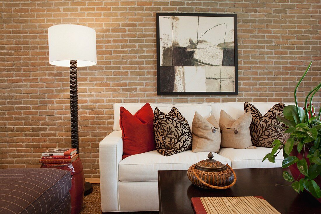 Contemporary living room with brick wall