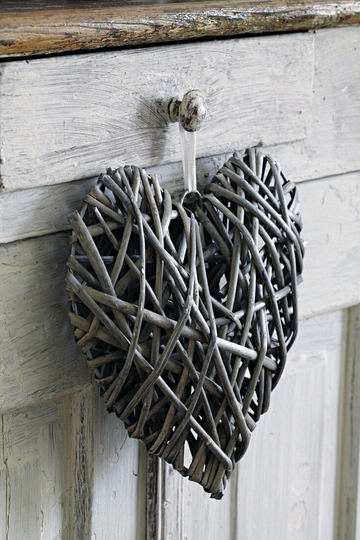 Heart shaped decoration hanging on handle
