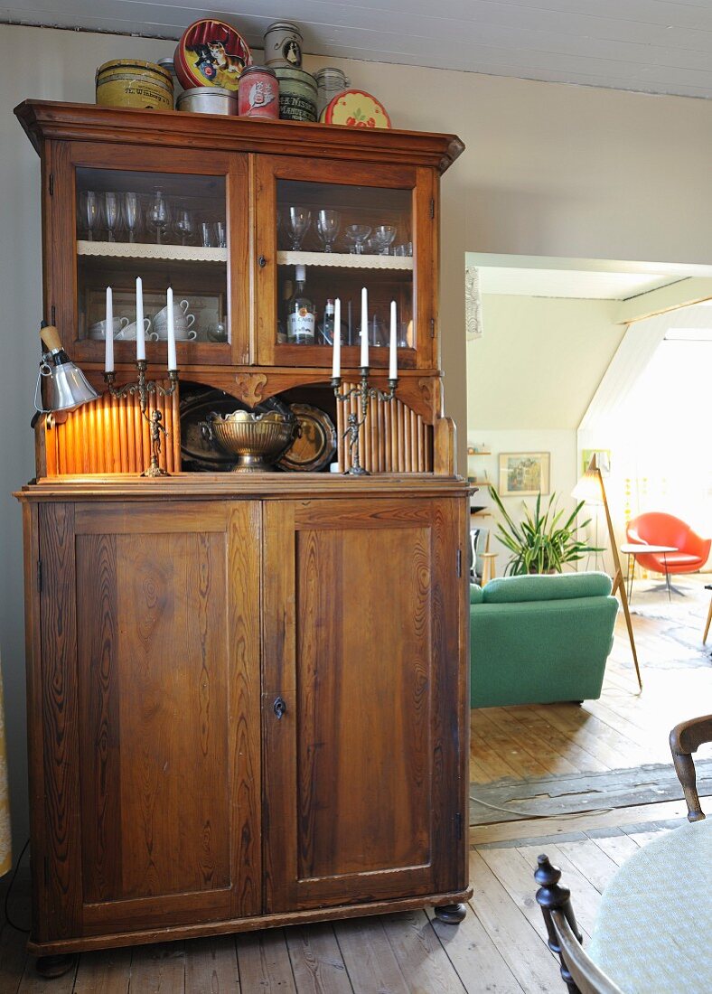 Antique, Wilhelmine-era dresser next to doorway leading to living room