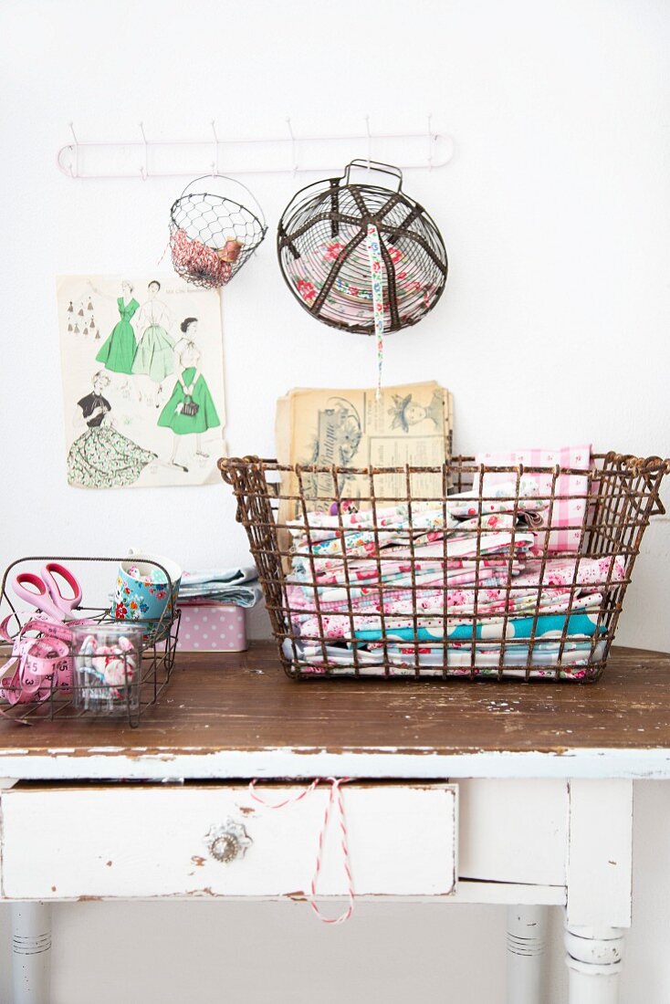 Various vintage wire baskets used to store sewing utensils
