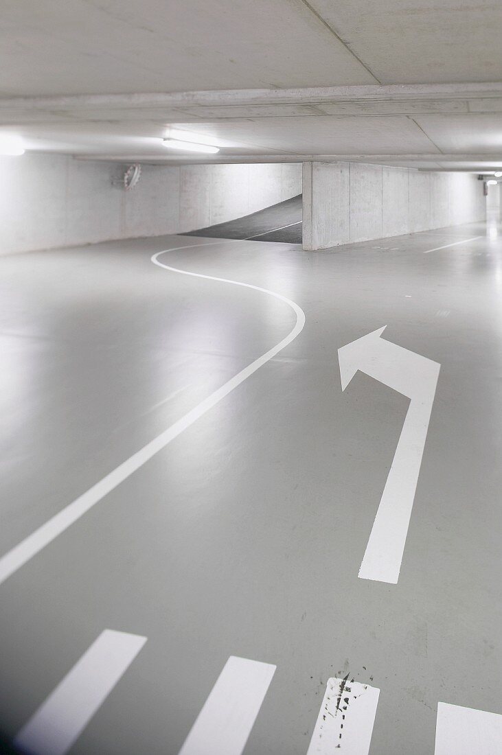 Driving lanes with road markings in underground car park