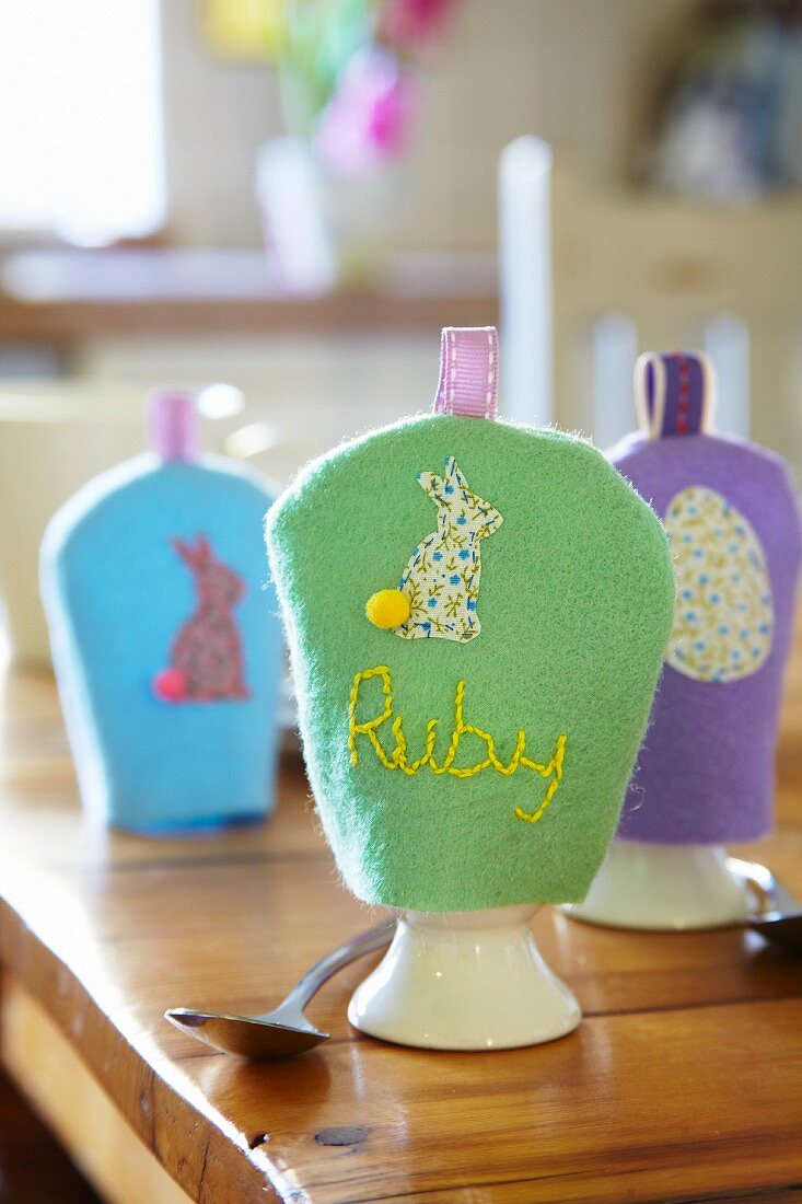 Hand-crafted felt egg cosies for Easter