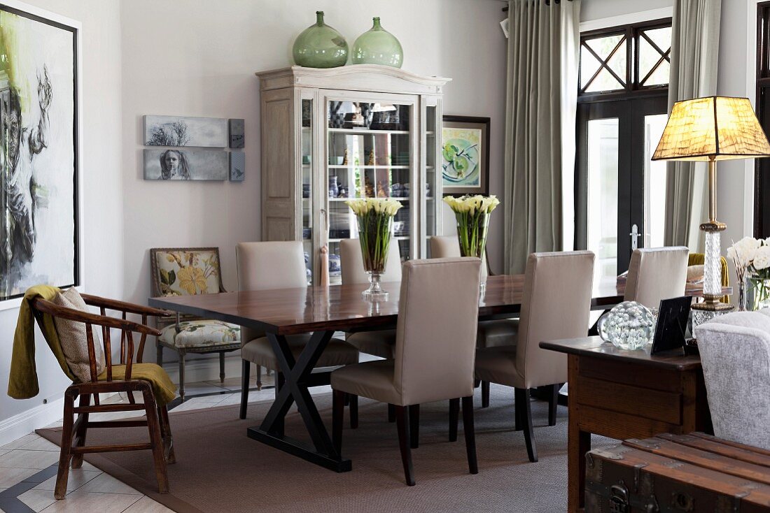 Upholstered chairs in elegant dining room in shades of grey